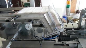 Facial tissue box packer machine with America Nordson glue applicator